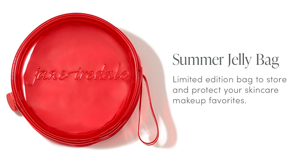 Rundes, leuchtend rotes, durchscheinendes Silikon-Necessaire mit geprägter Aufschrift „jane iredale“ vorne. Mit kleiner Trageschlaufe zur Aufbewahrung von Make-up wie Lip Oils, Pinseln oder LipDrink.