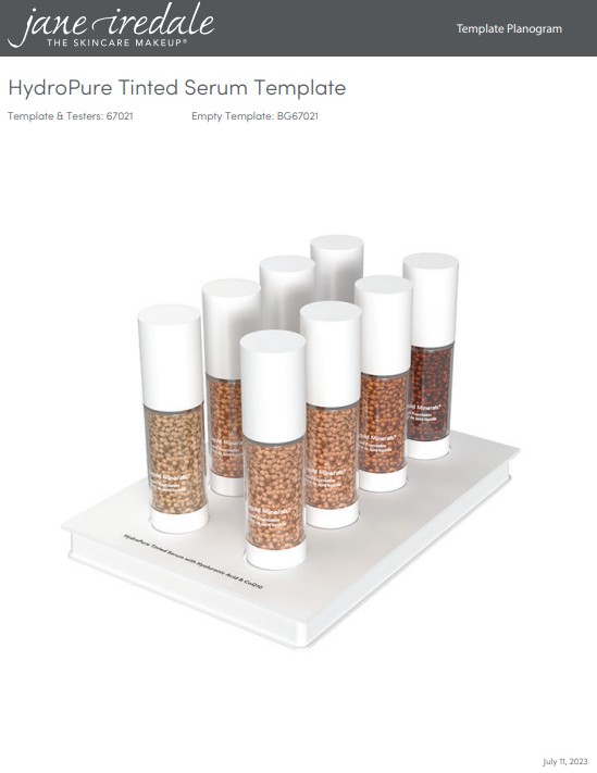 Weißes Produktdisplay mit neun zylindrischen Flaschen des Jane Iredale HydroPure Tinted Serums. Transparente Unterteile mit farbigen Serumkügelchen in Hauttönen von hellbeige bis dunkelbraun, weiße Pumpaufsätze.