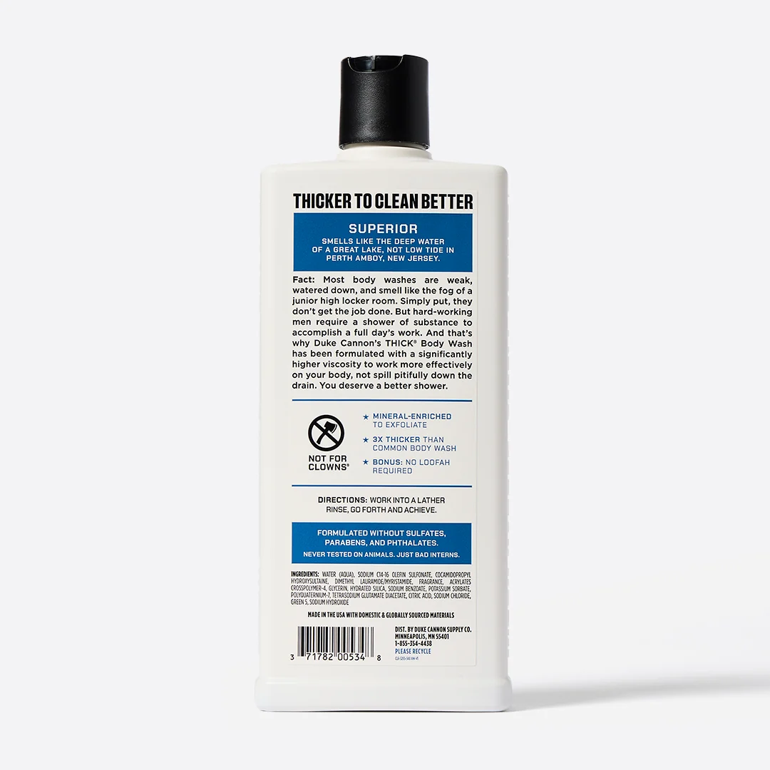 White rectangular bottle of DUKE CANNON SUPERIOR THICK BODY WASH 532ml with a black flip-top cap. Front features the logo and the slogan ‘THICKER TO CLEAN BETTER’.